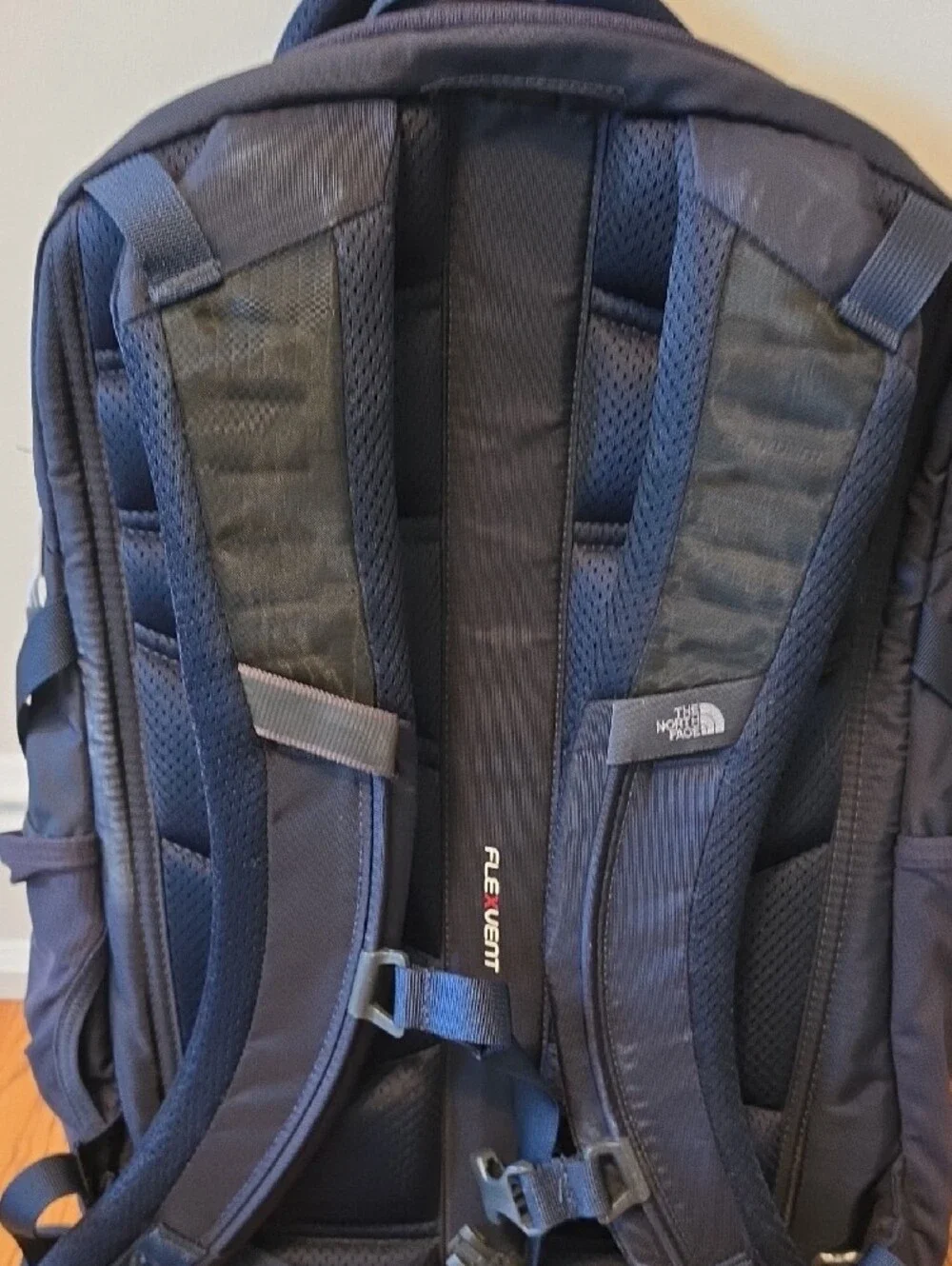 The North Face Navy Blue Backpack with Reflective Stripes